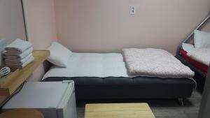 Cama o camas de una habitación en MK Liberty House