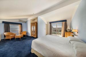 Un ou plusieurs lits dans un hébergement de l'établissement Hotel Luna Lughente