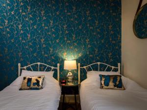 Кровать или кровати в номере Channel View Guest House