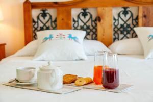 Un ou plusieurs lits dans un hébergement de l'établissement Hotel Luna Lughente