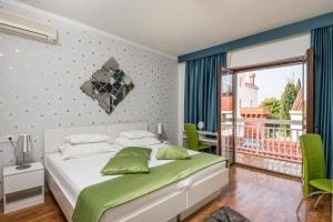 Posteľ alebo postele v izbe v ubytovaní Villa Voinic 2 + 37 fotografií