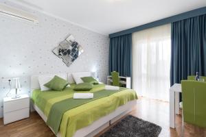 Posteľ alebo postele v izbe v ubytovaní Villa Voinic 2