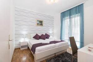 Posteľ alebo postele v izbe v ubytovaní Villa Voinic 2