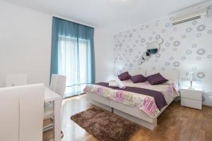 Posteľ alebo postele v izbe v ubytovaní Villa Voinic 2