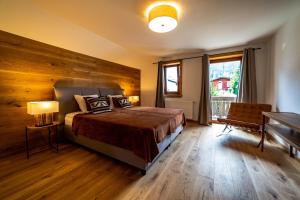 Posteľ alebo postele v izbe v ubytovaní Schneehaus Lodge