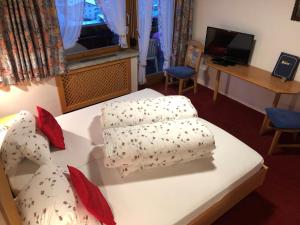 Postel nebo postele na pokoji v ubytování Hotel Garni Bergwelt