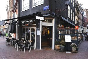 Ein Restaurant oder anderes Speiselokal in der Unterkunft Hotel Corner House 