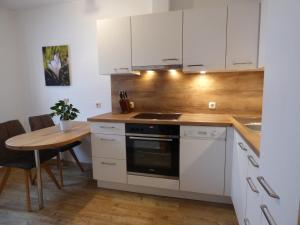 Kuchyň nebo kuchyňský kout v ubytování Ferienhaus Veider + 30 fotografií