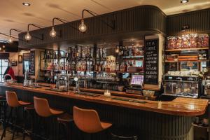 Lounge oder Bar in der Unterkunft Hotel Corner House