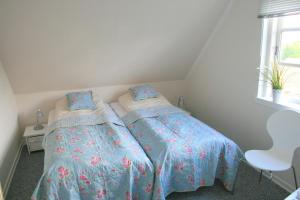 Postel nebo postele na pokoji v ubytování Hotel Ærøhus