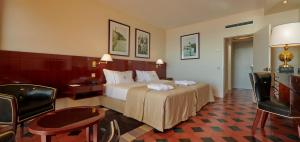 Cama ou camas em um quarto em Algarve Casino Hotel