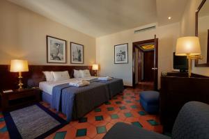 Cama ou camas em um quarto em Algarve Casino Hotel