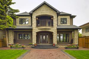 a home with a stone house at Westmount River Inn in Calgary