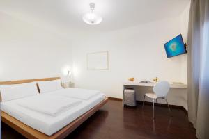 Postel nebo postele na pokoji v ubytování Hotel Asterix
