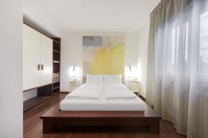 Postel nebo postele na pokoji v ubytování Hotel Asterix