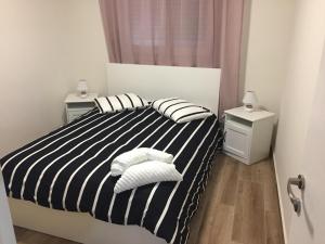 Кровать или кровати в номере בית בגולן