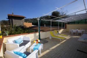 A patio or other outdoor area at Relais Villa Chiara free parking