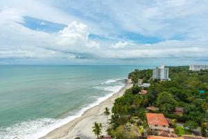 an aerial view of the beach and ocean at Sun n' Sand Retreat in La Chumicosa