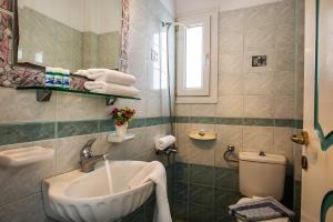 Koupelna v ubytování Hotel Dionysis Studios