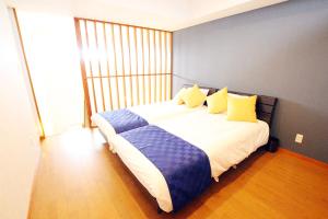 Letto o letti in una camera di Chura Minpaku Ishigaki