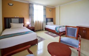 Hera Addis Hotel客房内的一张或多张床位