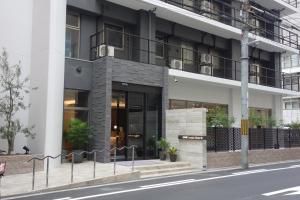 a building on the side of a street at Doutonbori Crystal Hotel Ⅱ in Osaka