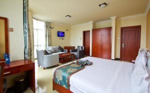 Hera Addis Hotel客房内的一张或多张床位