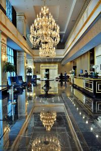 a hotel lobby with a large chandelier and a large lobby at Downtown Ankara Hotel in Ankara +78 photos