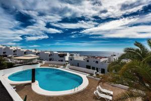 The swimming pool at or close to Gin Gin Vivienda Vacacional