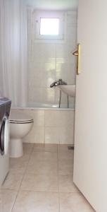 A bathroom at Villa Kiza Apartments