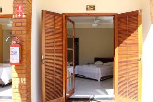 Un pat sau paturi într-o cameră la Pousada da Fonte