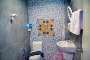 Koupelna v ubytování Baan Tubkaek Hotel