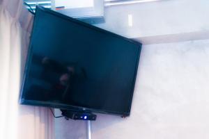 TV a/nebo společenská místnost v ubytování Baan Tubkaek Hotel