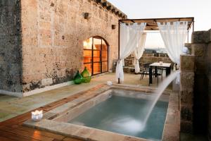 The swimming pool at or close to Dimora Sighé, exclusive rural villa with hydromassage pool