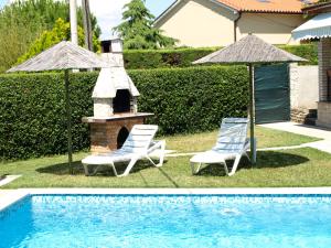 The swimming pool at or close to Vacation apartment with Pool