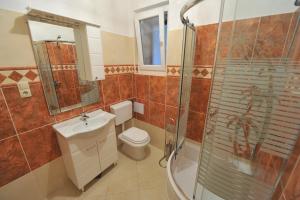 Kúpeľňa v ubytovaní Apartments Villa White House