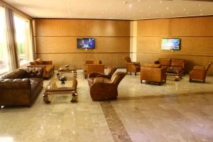 Χώρος καθιστικού στο Palm Hotel