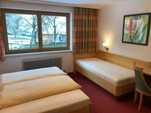 Katil atau katil-katil dalam bilik di Fiechtl Apartments