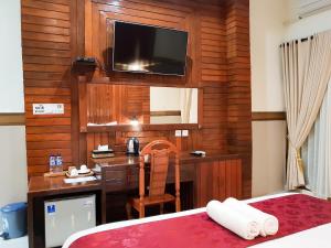 Ein Bett oder Betten in einem Zimmer der Unterkunft Ogix Cliff Paradise