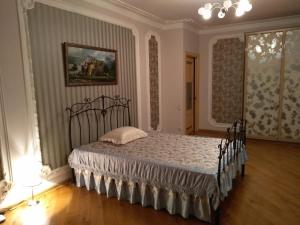Krevet ili kreveti u jedinici u objektu Apartment On Pavshinkiy Bulvar