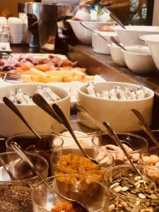 a buffet with many different types of food on a table at Domaine du Ferret Restaurant & Spa in Cap-Ferret