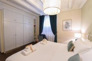 Il Giardino Segreto tesisinde bir odada yatak veya yataklar