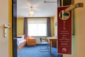 Ένα ή περισσότερα κρεβάτια σε δωμάτιο στο Hotel Elbinsel free parking