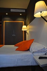 Postel nebo postele na pokoji v ubytování Hotel Can Batiste