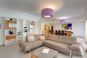 A seating area at Seaview Apartment In Fort Cambridge, Sliema