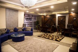 Posezení v ubytování Villa 14 Suites
