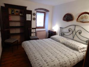 Postel nebo postele na pokoji v ubytování Il Borgo della Colomba