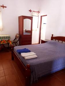 A bed or beds in a room at Hopedaje Felisa
