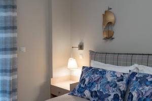 A bed or beds in a room at Absolute Athens VII