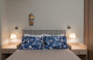 A bed or beds in a room at Absolute Athens VII